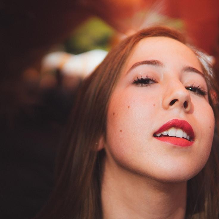 Kaveri Mehta, Lead Design Curator at WaveLevelDatum, reviewing corporate floral arrangements